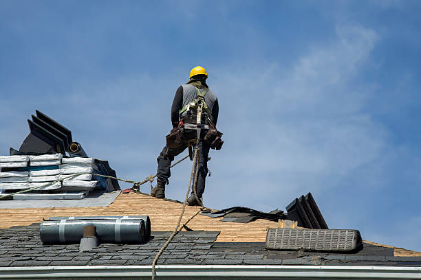 Professional Roof Replacement technician working in Nehalem, OR